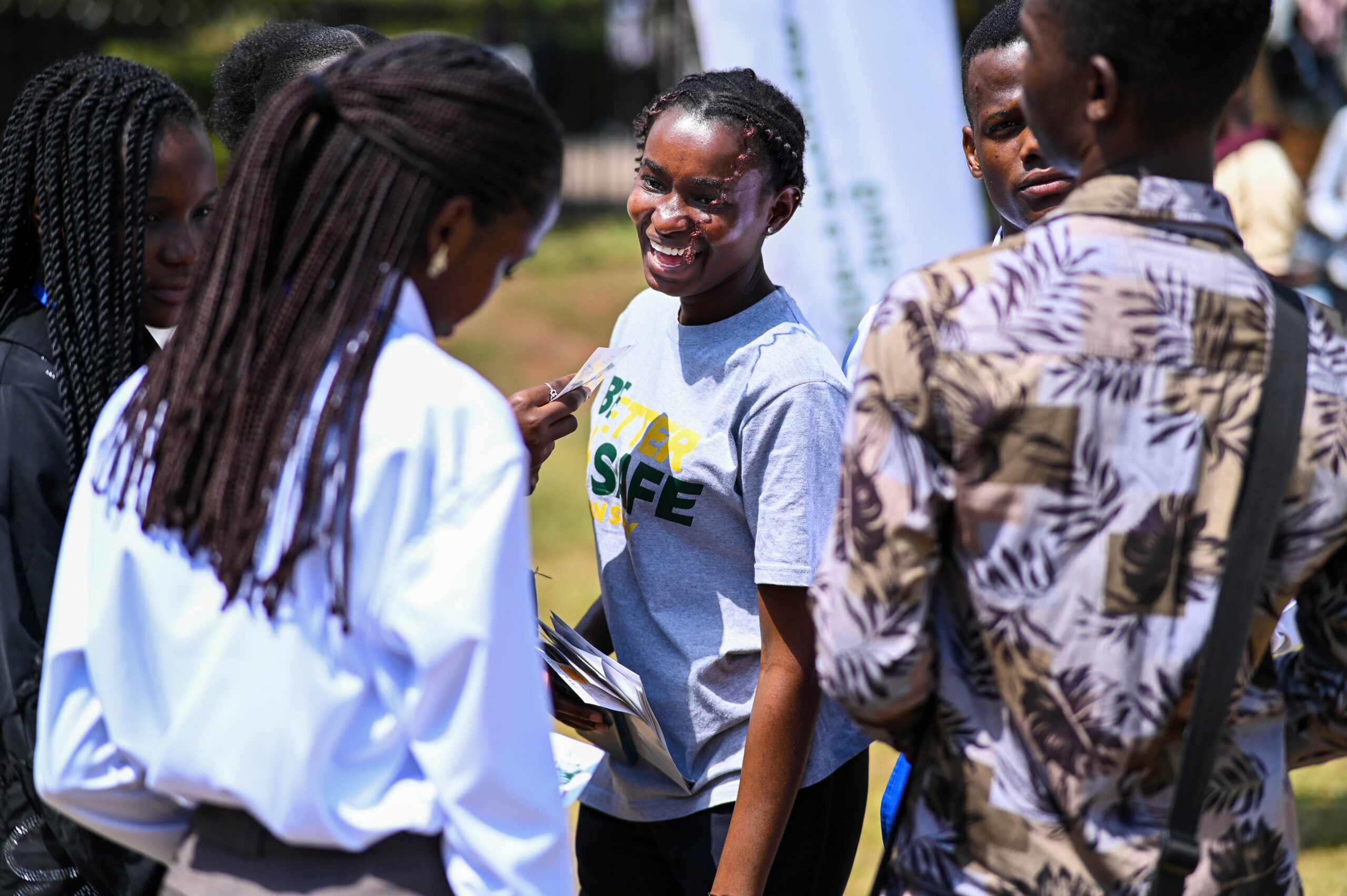 Young woman laughing with friends during an Emerging Leaders Program activity