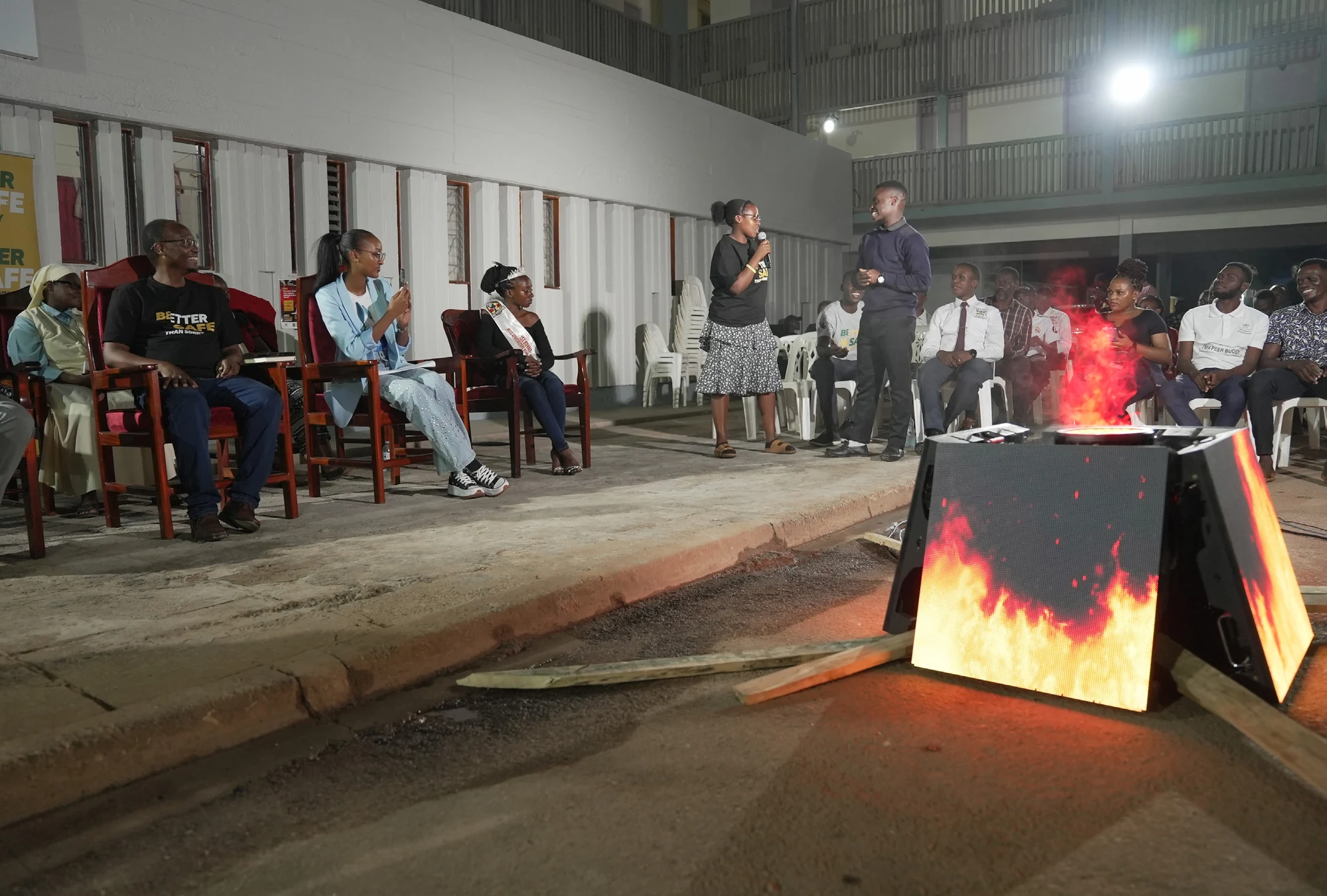 Students gathered around a fire at an evening ELP fireside conversation.